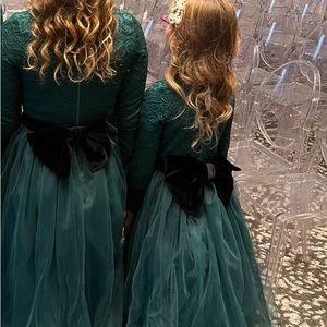 - Size 8 girls custom emerald green gown with velour black bow